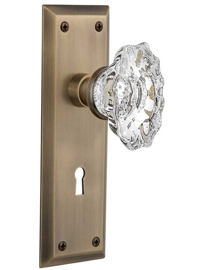New York Door Set with Keyhole and Chateau Crystal Glass Knobs in Antique Brass.